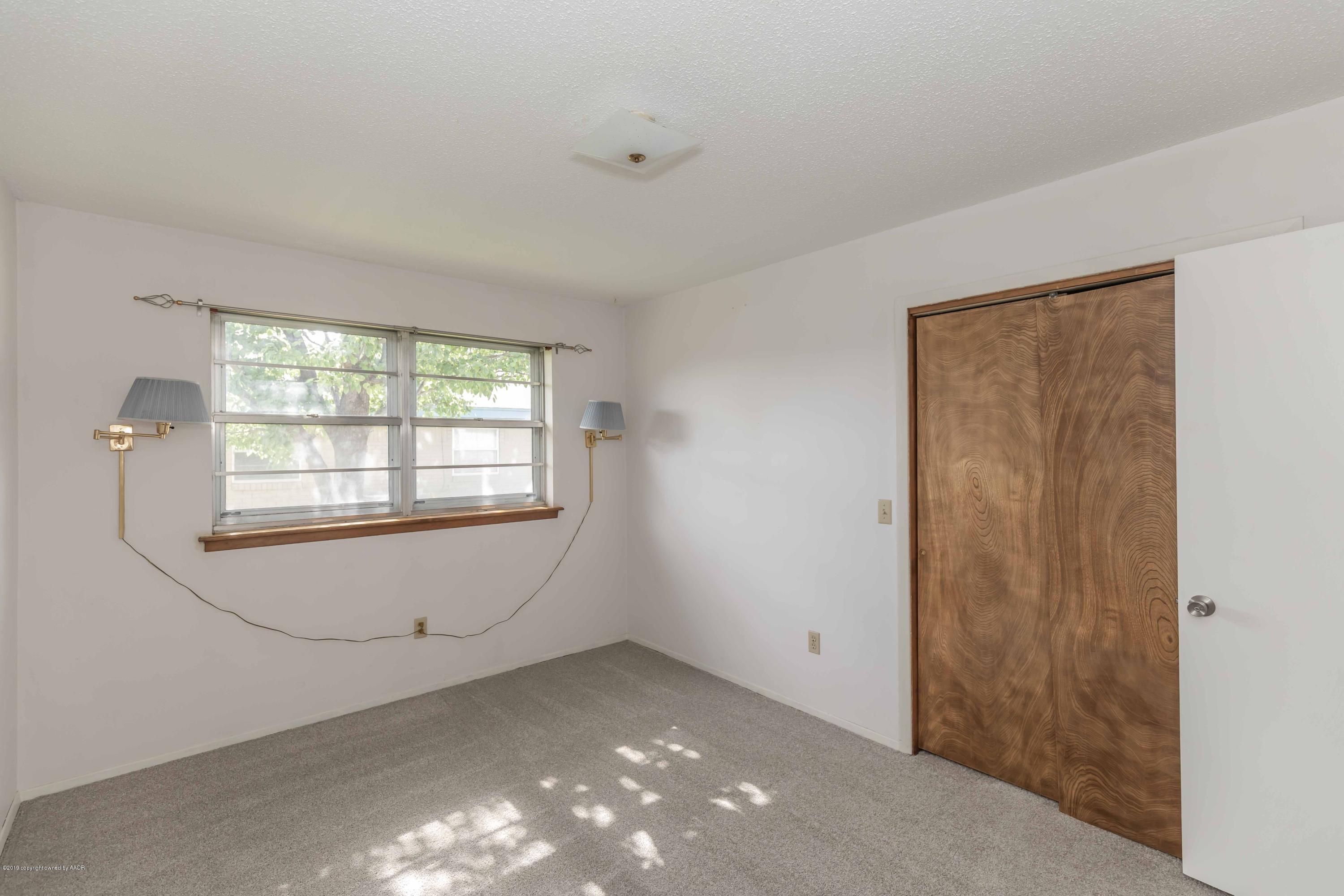 7206 Gainsborough Road Amarillo, TX 79106 - Photo 29 of 41 a view of an empty room with a window