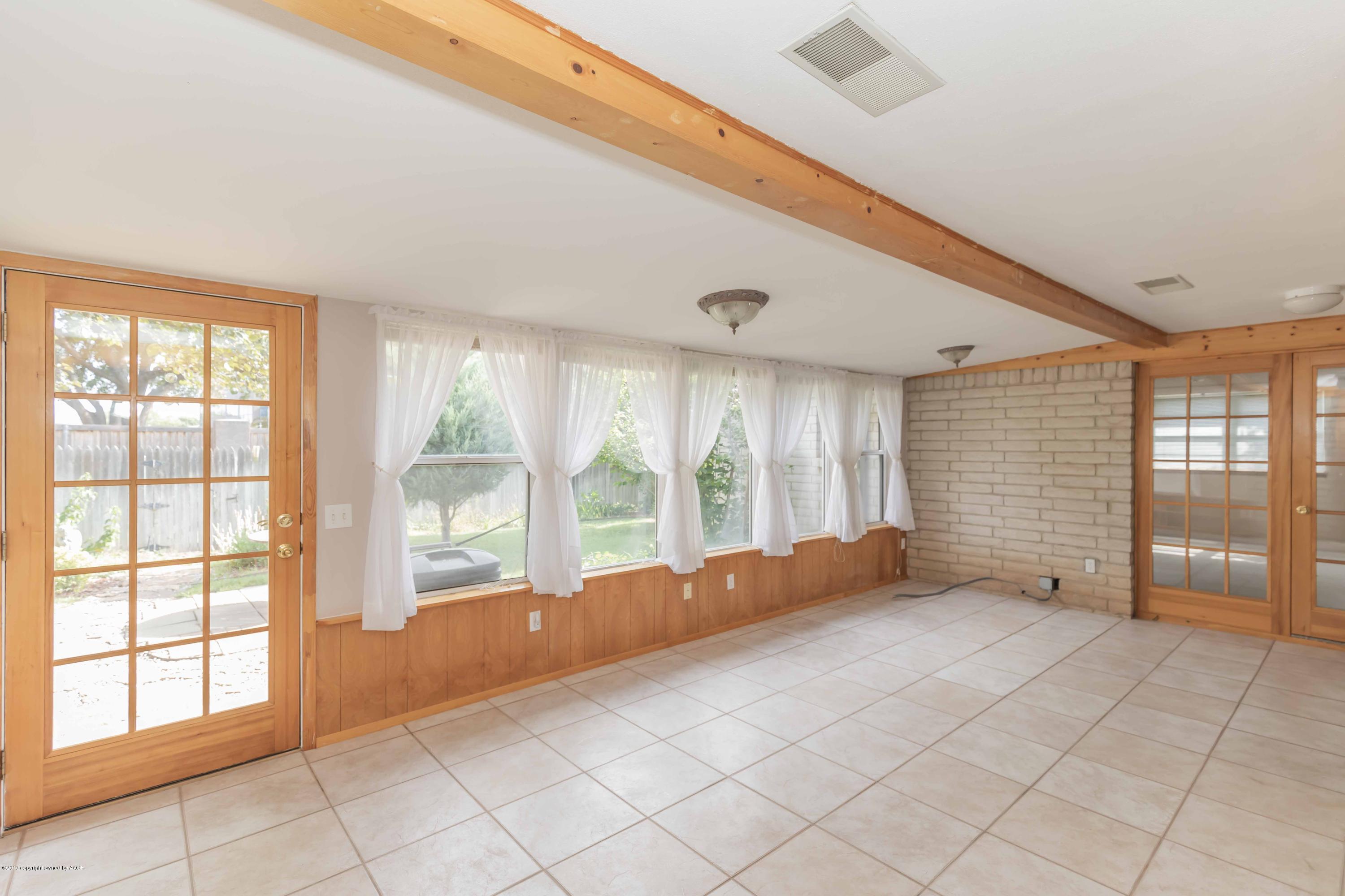 7206 Gainsborough Road Amarillo, TX 79106 - Photo 34 of 41 a view of an empty room with a window