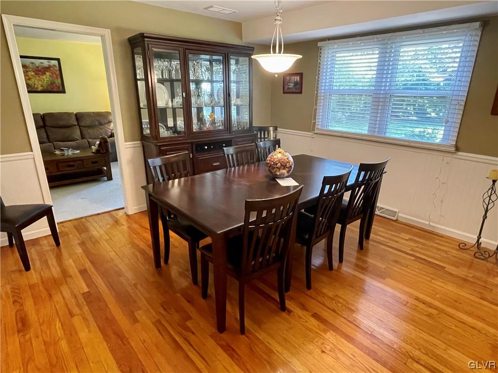 1295 Stark Road Bethlehem, PA 18017 - Photo 19 of 36 a view of a a dining room with furniture window and wooden floor