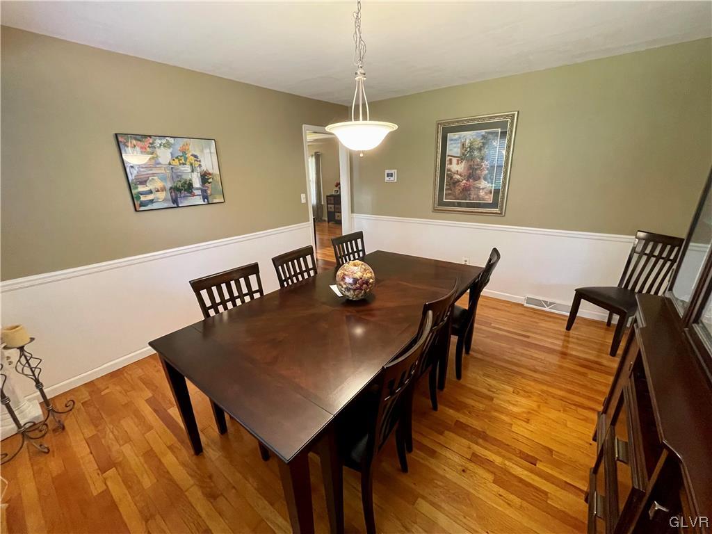 1295 Stark Road Bethlehem, PA 18017 - Photo 20 of 36 a view of a dining room with furniture and wooden floor