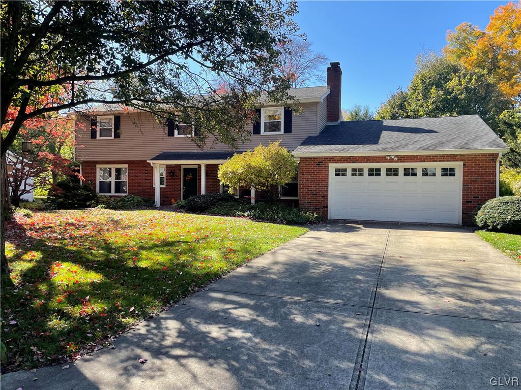 1295 Stark Road Bethlehem, PA 18017 - Photo 2 of 36 a front view of a house with a yard