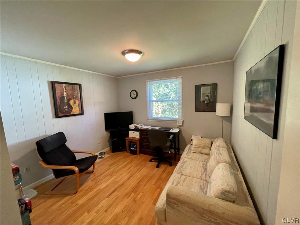 1295 Stark Road Bethlehem, PA 18017 - Photo 23 of 36 a bedroom with a bed and wooden floor