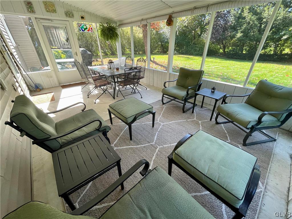 1295 Stark Road Bethlehem, PA 18017 - Photo 10 of 36 a living room with furniture and a floor to ceiling window