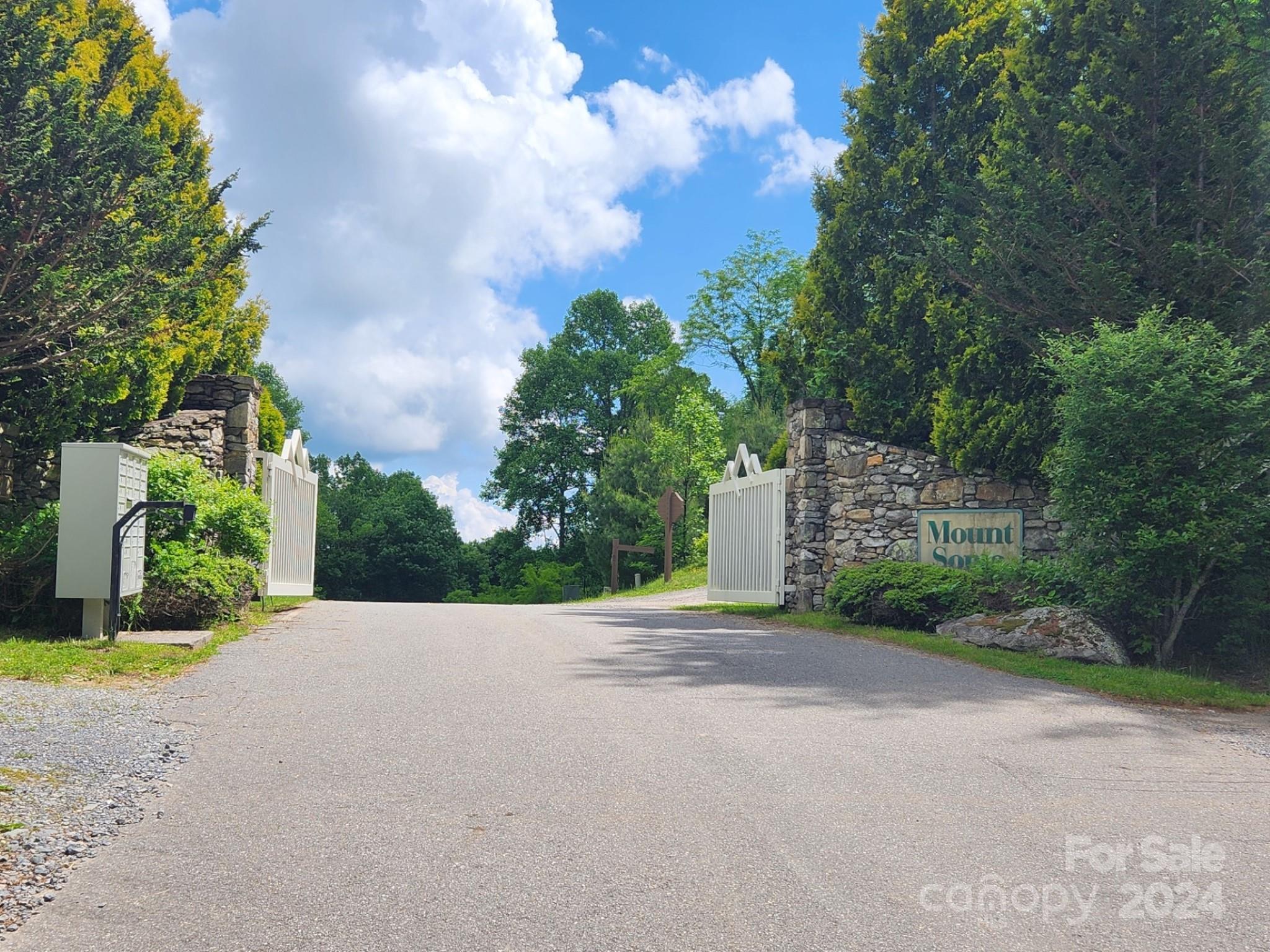 0 Chandra Lane, Unit 402 Leicester, NC 28748 - Photo 2 of 7 a view of a house with a street