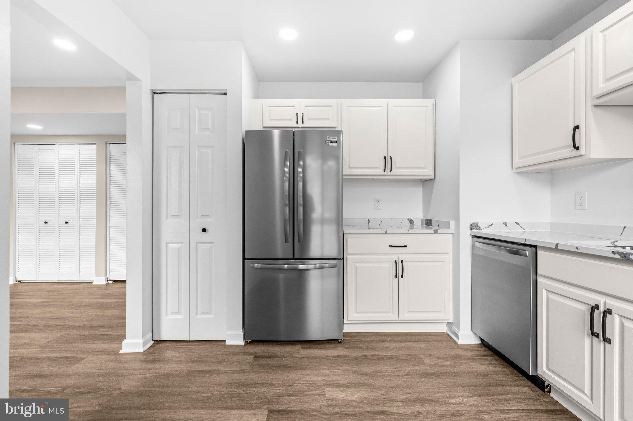 7973 Riggs Road, Unit 1 Hyattsville, MD 20783 - Photo 9 of 24 Modern kitchen with sleek finishes.