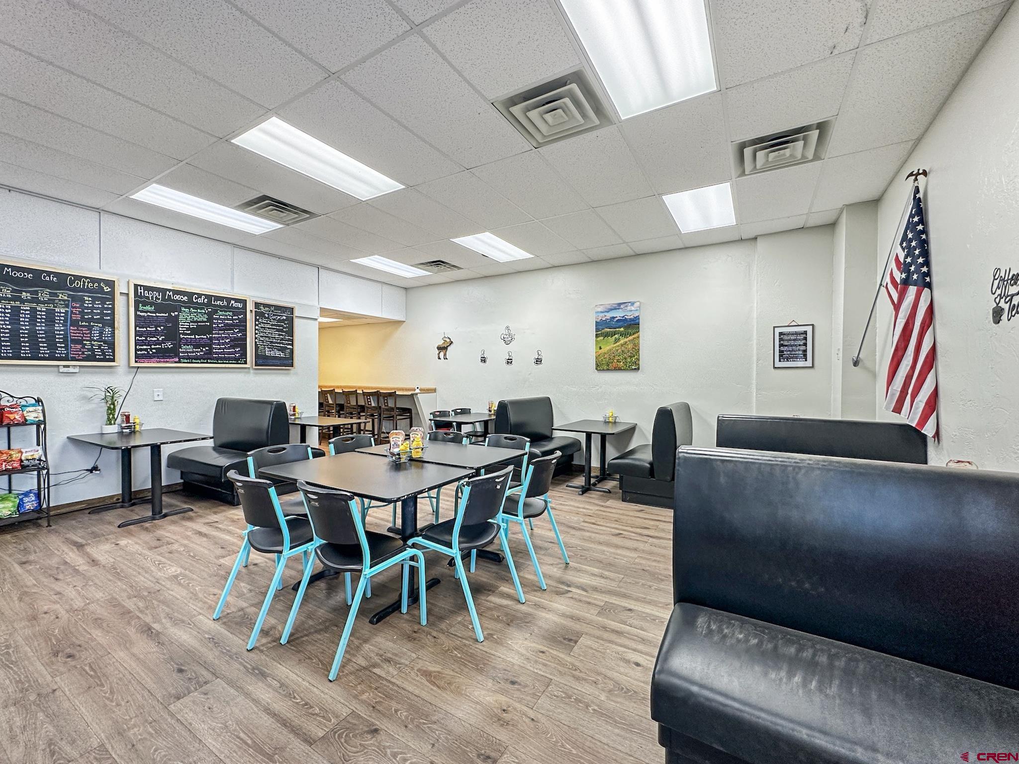 12840 Highway 65 Eckert, CO 81418 - Photo 13 of 34 a view of a livingroom with furniture and wooden floor