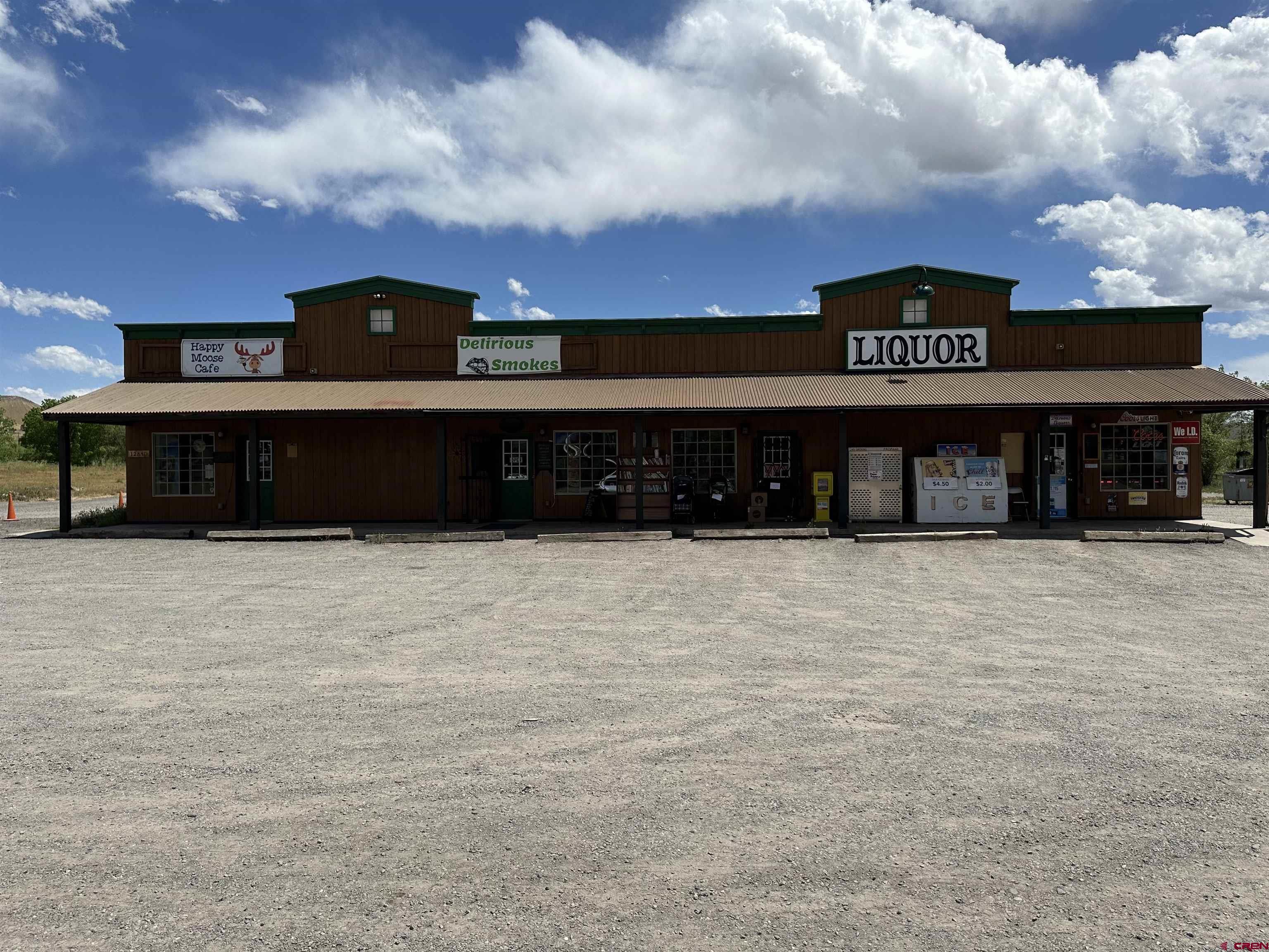 12840 Highway 65 Eckert, CO 81418 - Photo 2 of 34 a view of a building with a yard