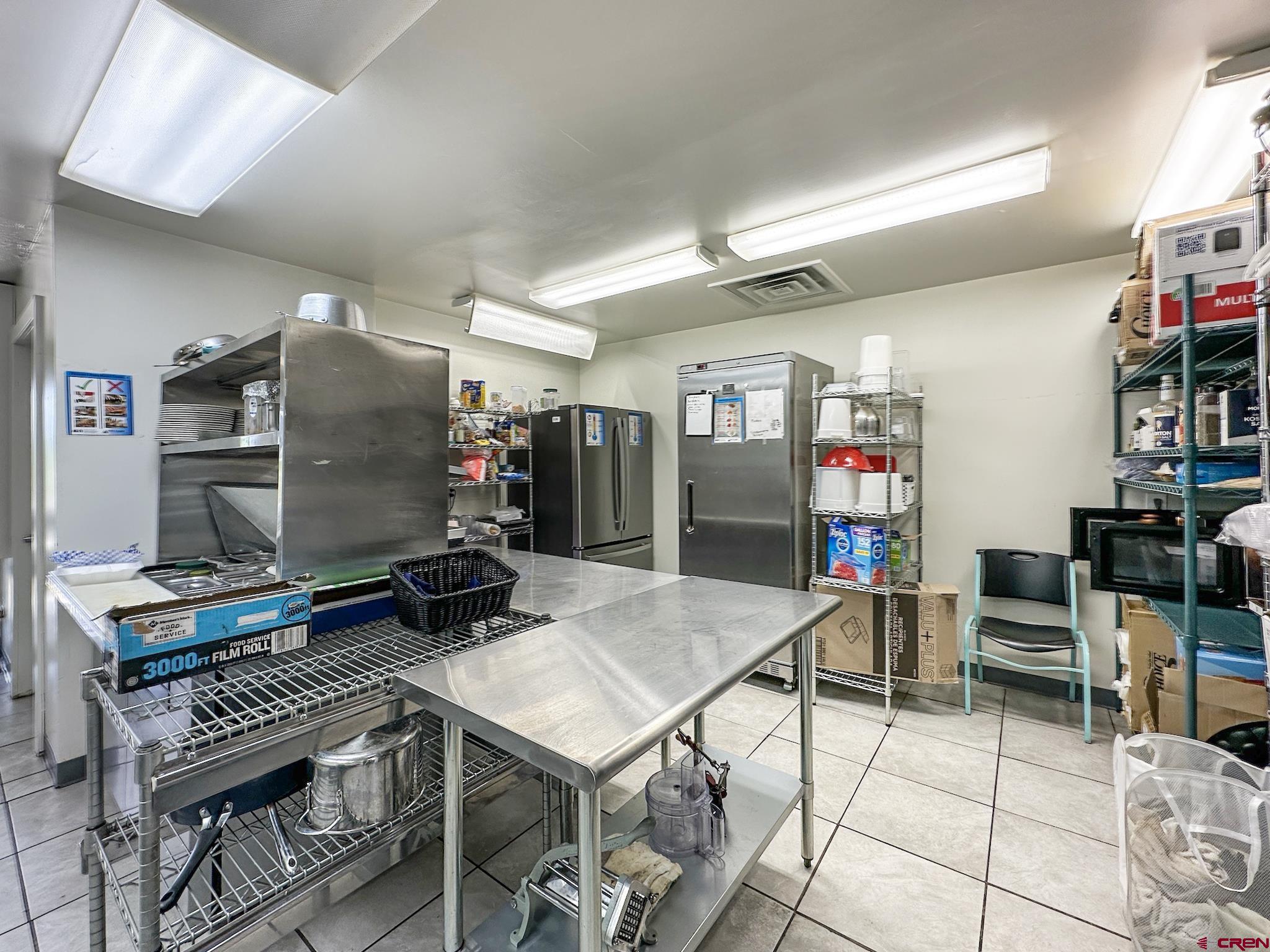 12840 Highway 65 Eckert, CO 81418 - Photo 21 of 34 a view of a dining room with furniture