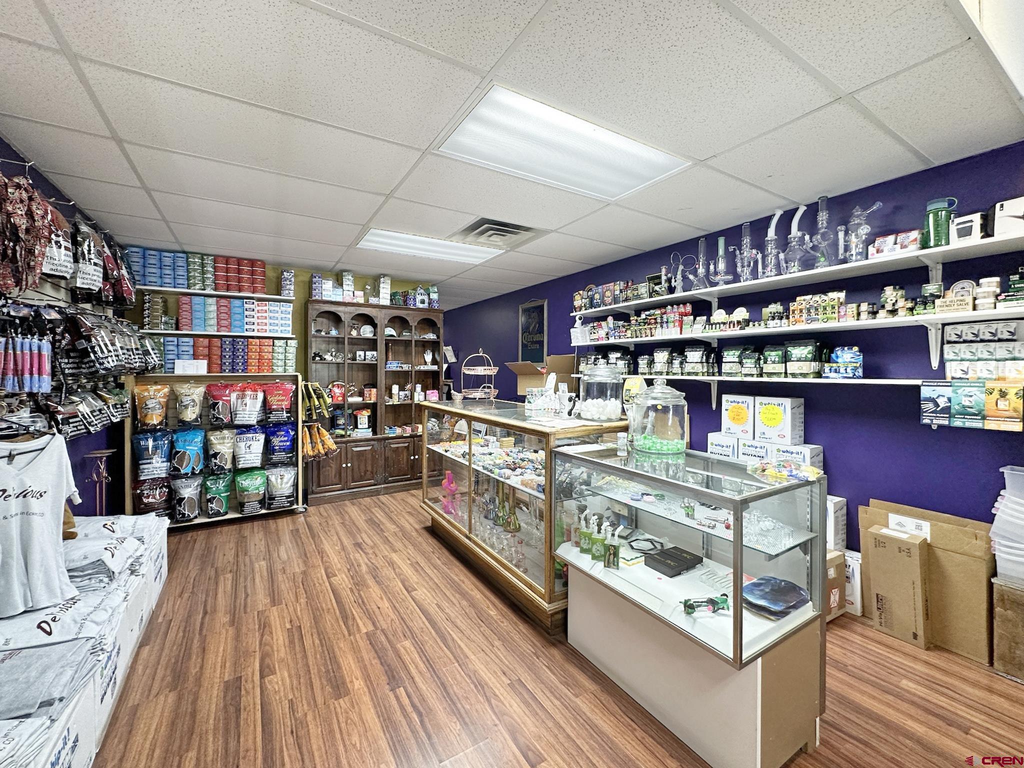 12840 Highway 65 Eckert, CO 81418 - Photo 22 of 34 a kitchen with stainless steel appliances granite countertop lots of wooden cabinets and a granite counter tops