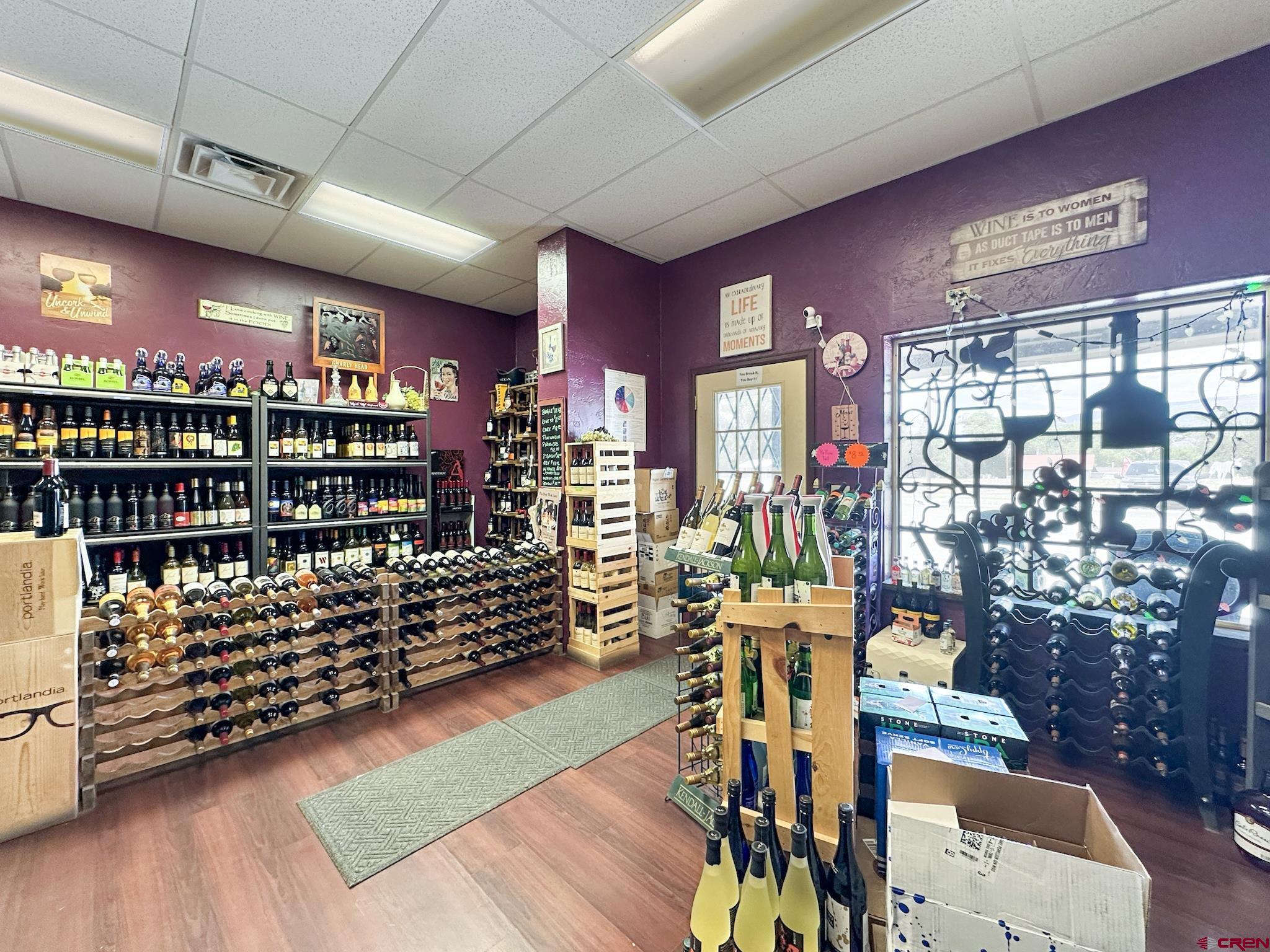 12840 Highway 65 Eckert, CO 81418 - Photo 26 of 34 a reading room with lots of wooden furniture and a book shelf
