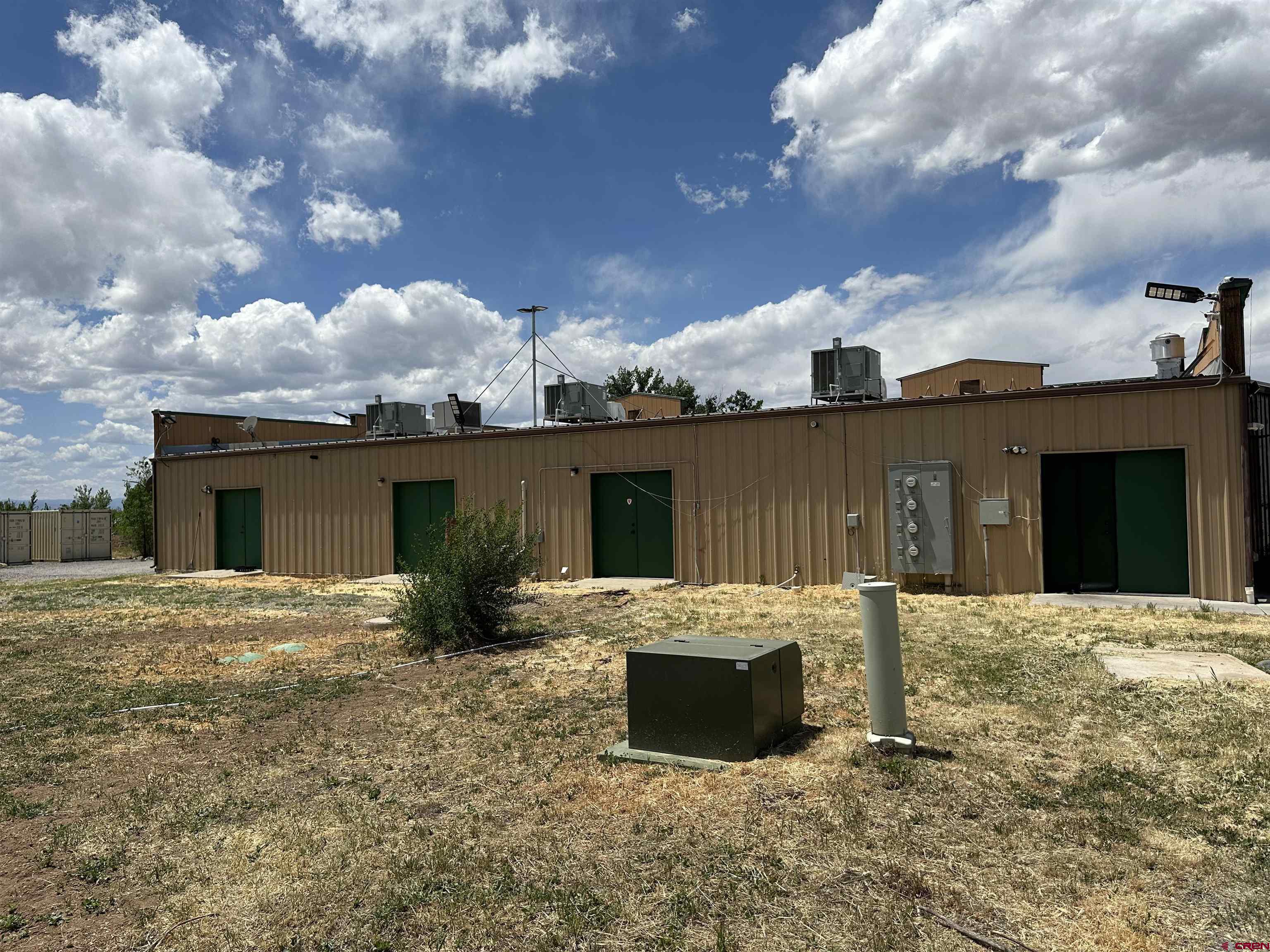 12840 Highway 65 Eckert, CO 81418 - Photo 32 of 34 a view of a house with a yard