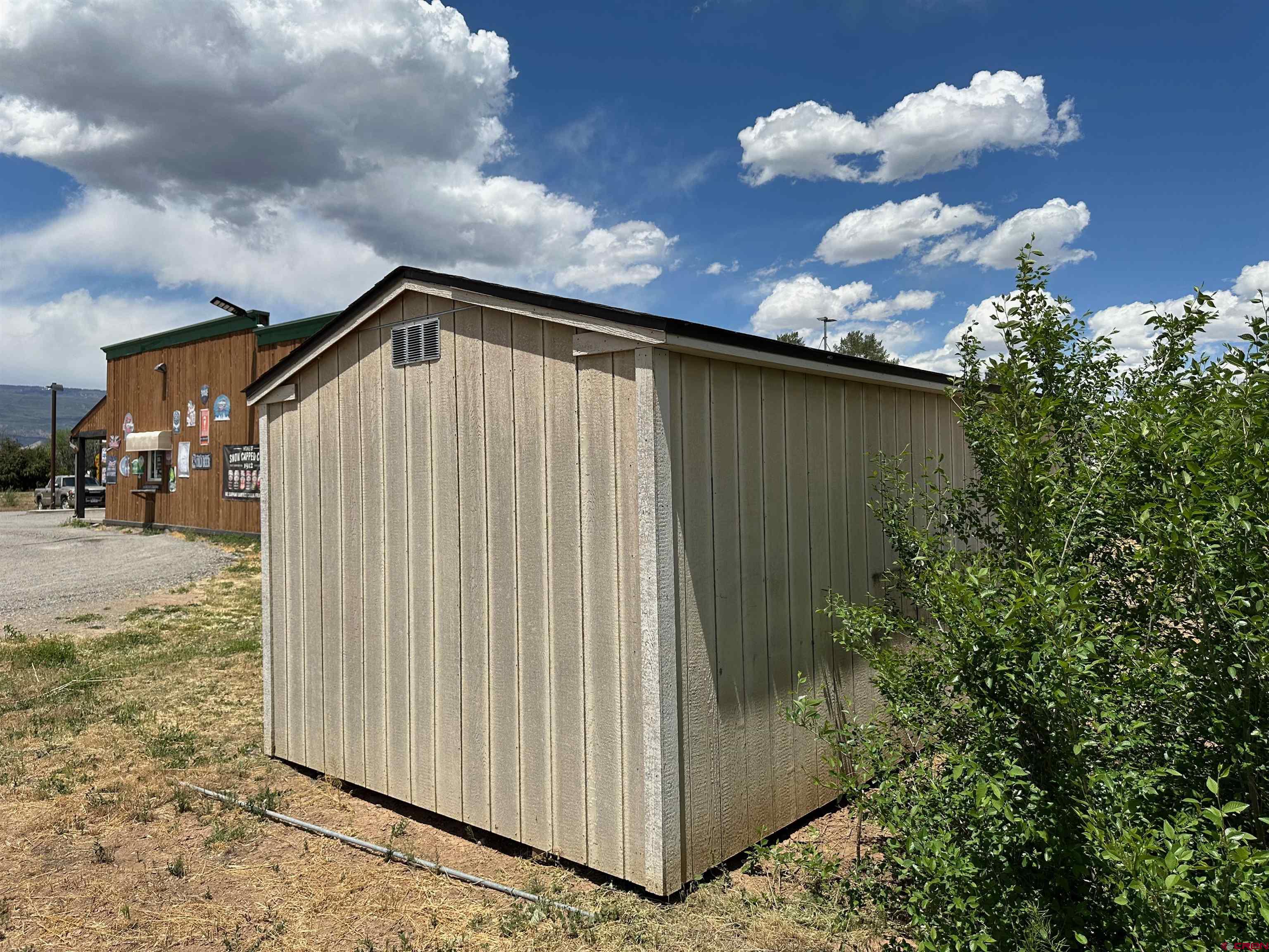 12840 Highway 65 Eckert, CO 81418 - Photo 33 of 34 a backyard of a house