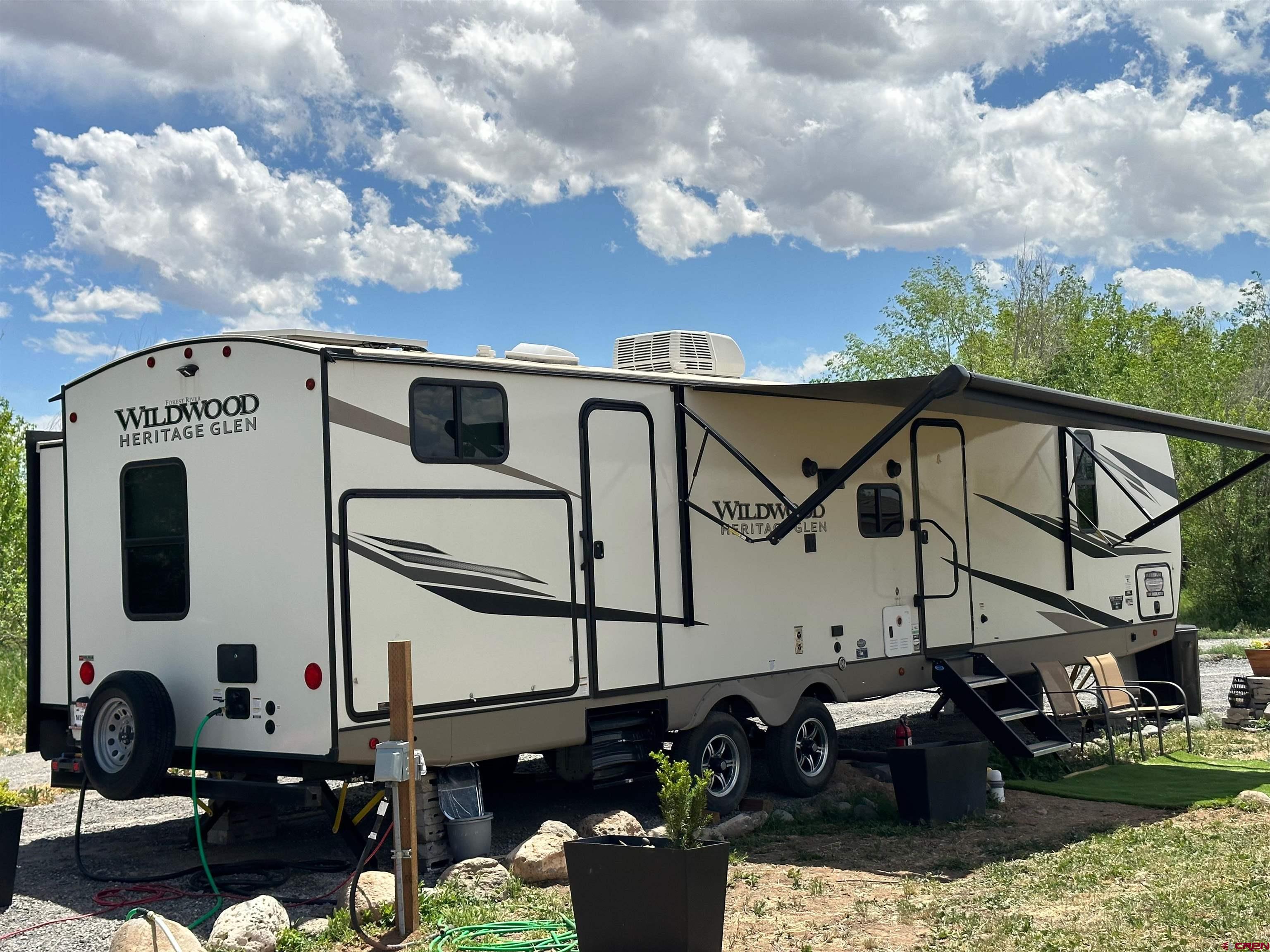 12840 Highway 65 Eckert, CO 81418 - Photo 34 of 34 a front view of a house with garden