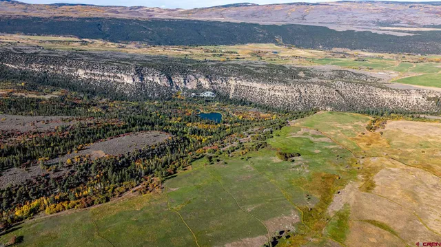 a view of an ocean with a mountain