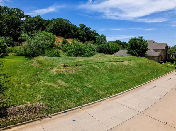 a view of a garden from a balcony