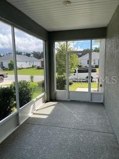 8934 Southwest 78th Court Ocala, FL 34476 - Photo 3 of 11 a view of a large room with a large window