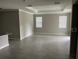 8934 Southwest 78th Court Ocala, FL 34476 - Photo 4 of 11 a view of an empty room with a window
