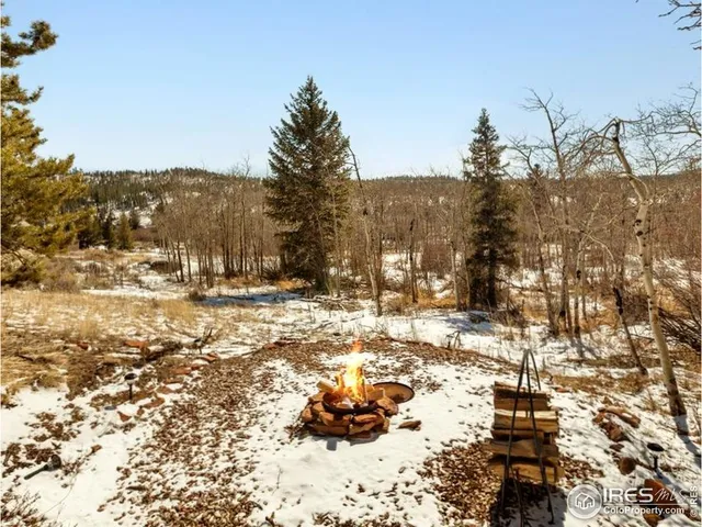 a view of snow on the road