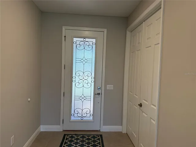 a kitchen with kitchen island granite countertop stainless steel appliances and a counter top space