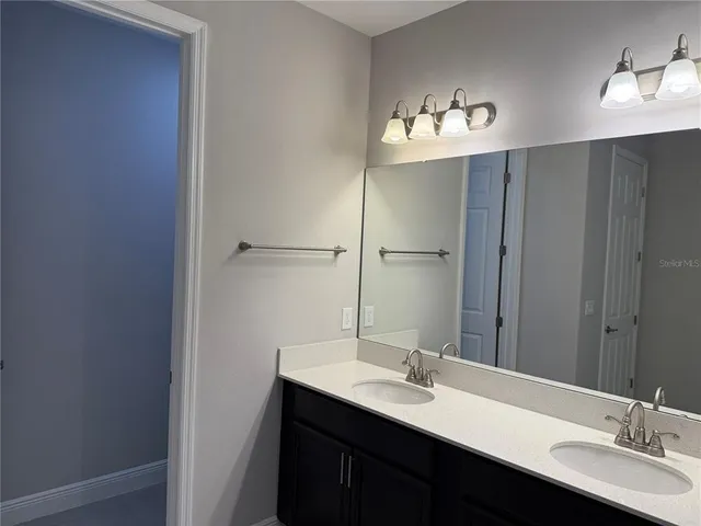 a view of a lake with a city