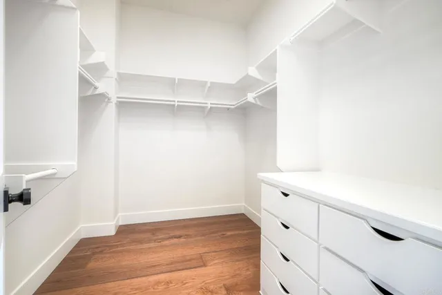 a view of an empty walk in closet