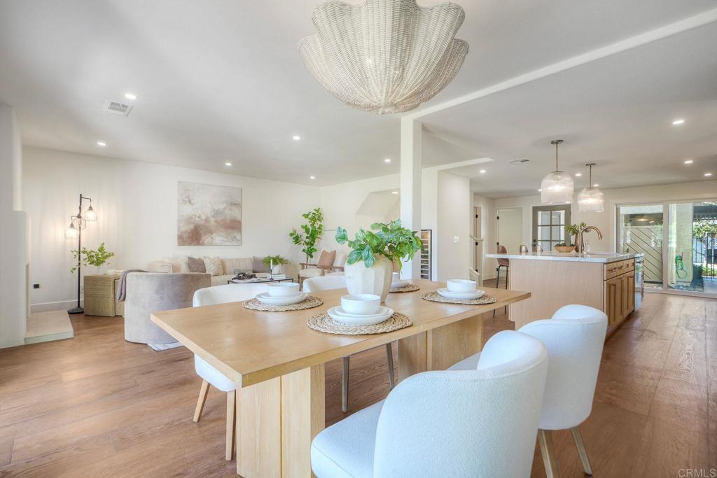4051 Avenida Brisa Rancho Santa Fe, CA 92091 - Photo 3 of 30 a dining room with furniture and a chandelier