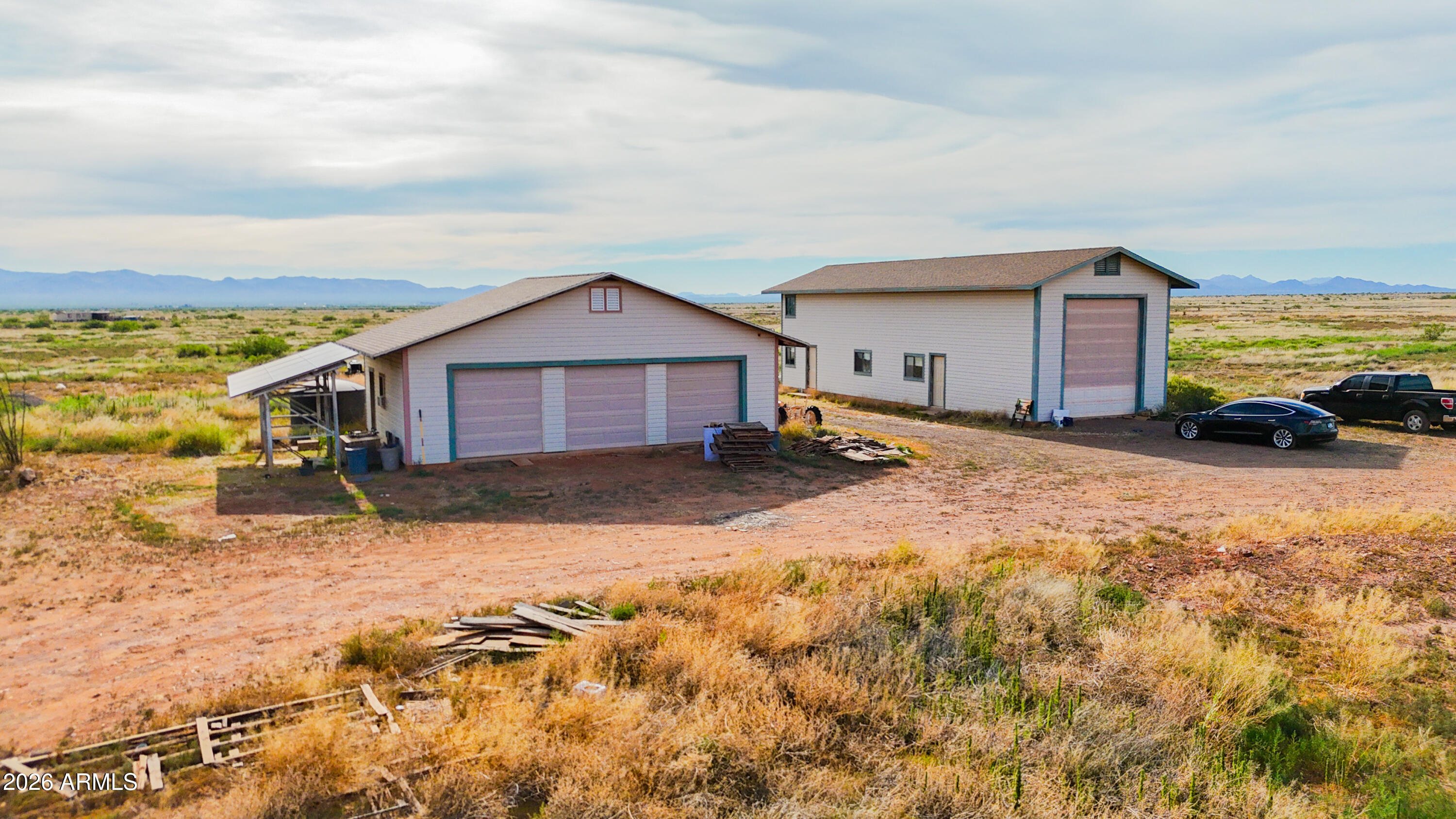 3429 West Markel Road Douglas, AZ 85607 - Photo 5 of 47 a view of a house with a yard