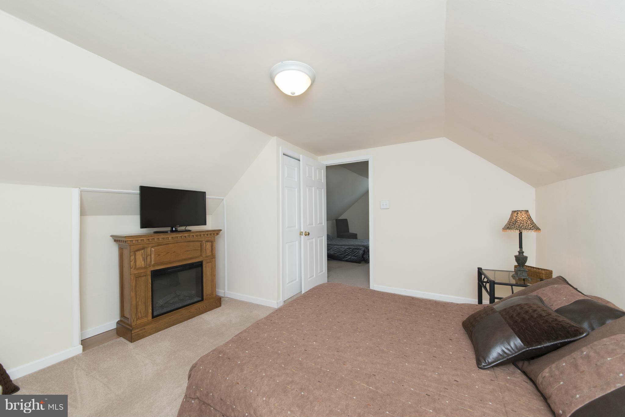 3117 Cornwall Road Baltimore, MD 21222 - Photo 23 of 30 a living room with furniture and a flat screen tv