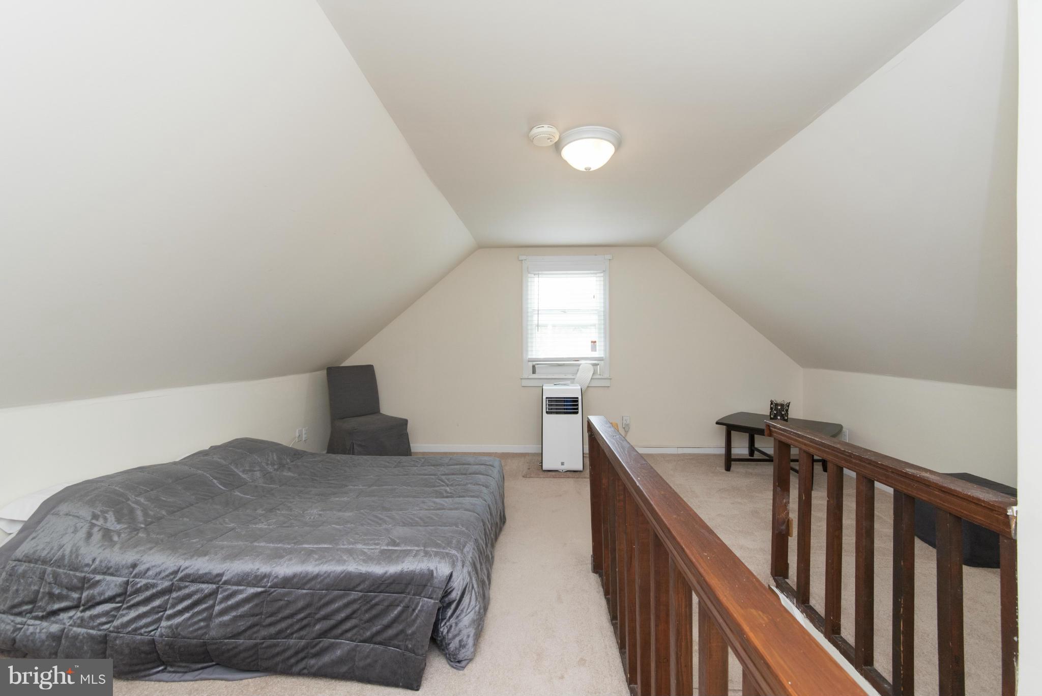 3117 Cornwall Road Baltimore, MD 21222 - Photo 25 of 30 a living room with furniture and stairs