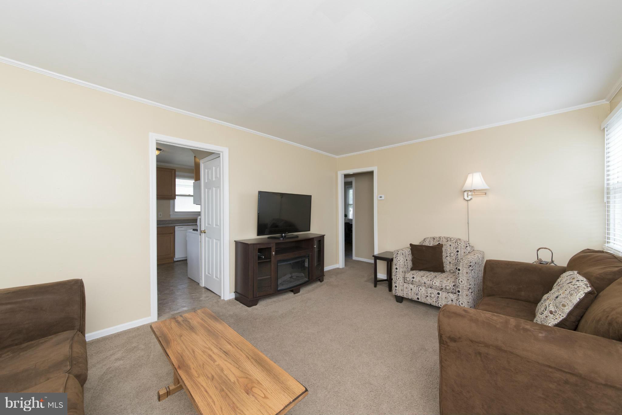 3117 Cornwall Road Baltimore, MD 21222 - Photo 5 of 30 a living room with furniture and a flat screen tv