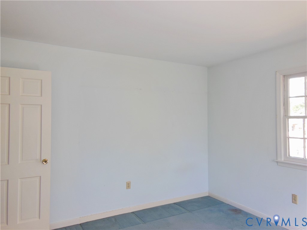 8218 Overbury Road Richmond, VA 23227 - Photo 32 of 37 a view of an empty room and window