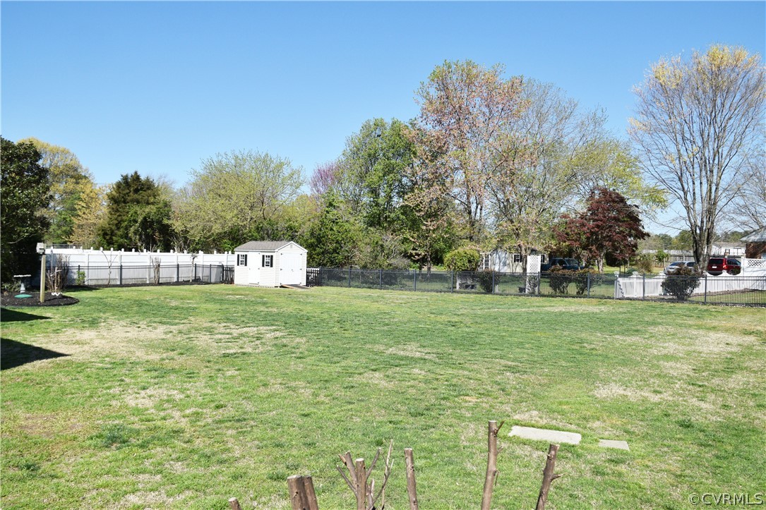 4204 Hidden Valley Road Chester, VA 23831 - Photo 8 of 50 Backyard with Detached Storage Shed