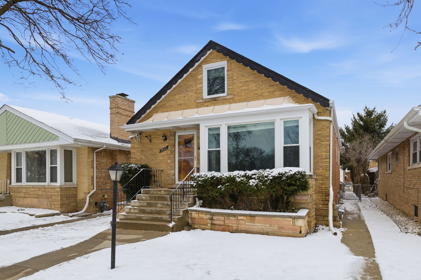 7023 29th Place Berwyn, IL 60402 - Photo 1 of 36 a front view of a house with porch