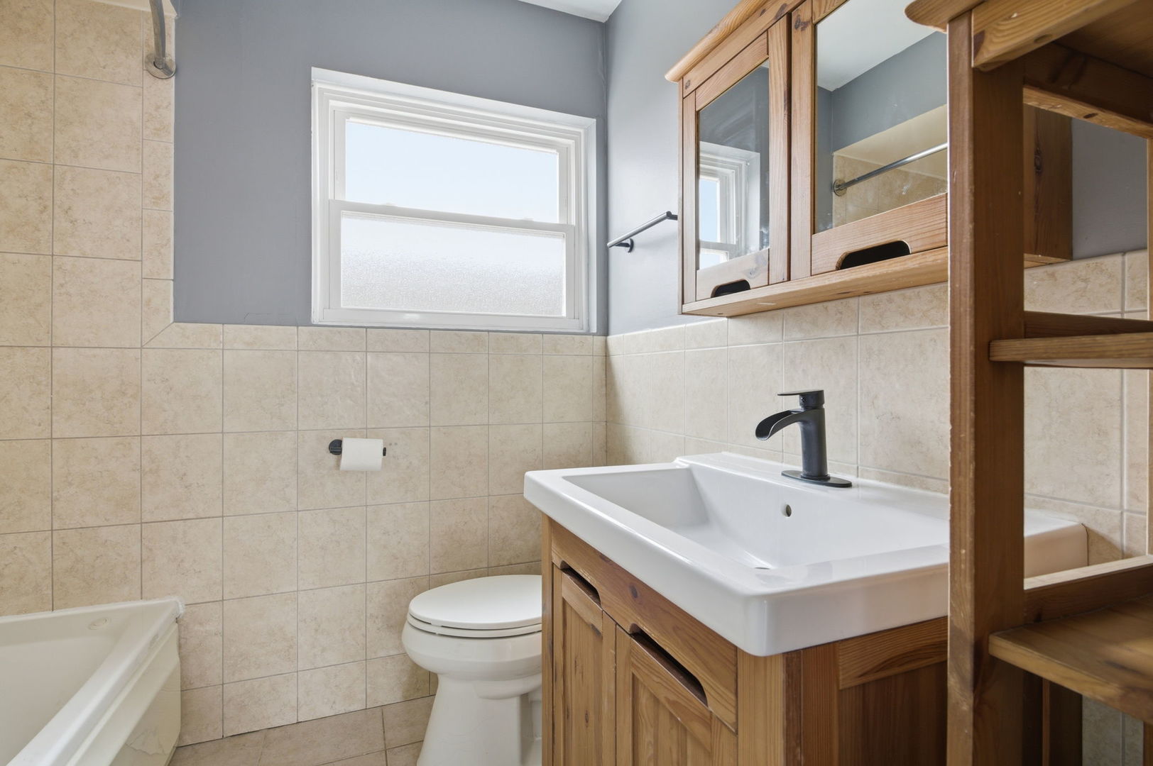 7023 29th Place Berwyn, IL 60402 - Photo 13 of 36 a bathroom with a sink and a toilet
