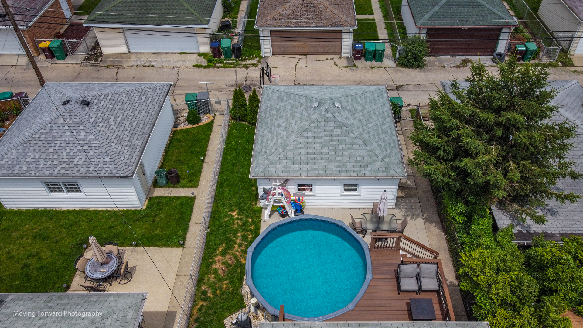 7023 29th Place Berwyn, IL 60402 - Photo 30 of 36 an aerial view of a house with swimming pool and garden