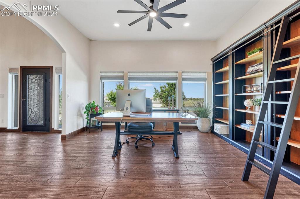 19210 Royal Troon Drive Monument, CO 80132 - Photo 18 of 50 a workspace with furniture window and wooden floor