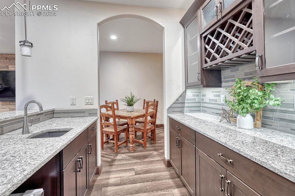 19210 Royal Troon Drive Monument, CO 80132 - Photo 35 of 50 a kitchen with a sink and cabinets