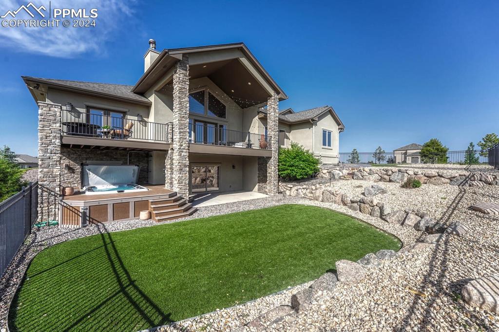 19210 Royal Troon Drive Monument, CO 80132 - Photo 47 of 50 a view of a house with a yard porch and sitting area