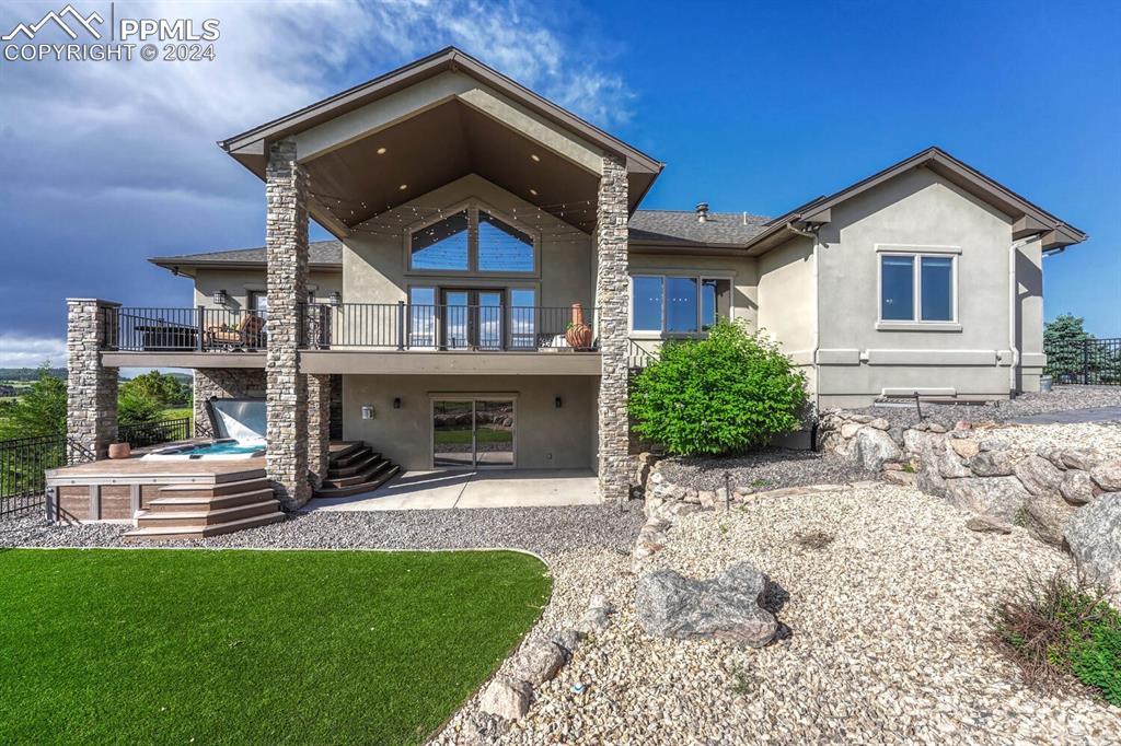 19210 Royal Troon Drive Monument, CO 80132 - Photo 48 of 50 a front view of a house with a yard