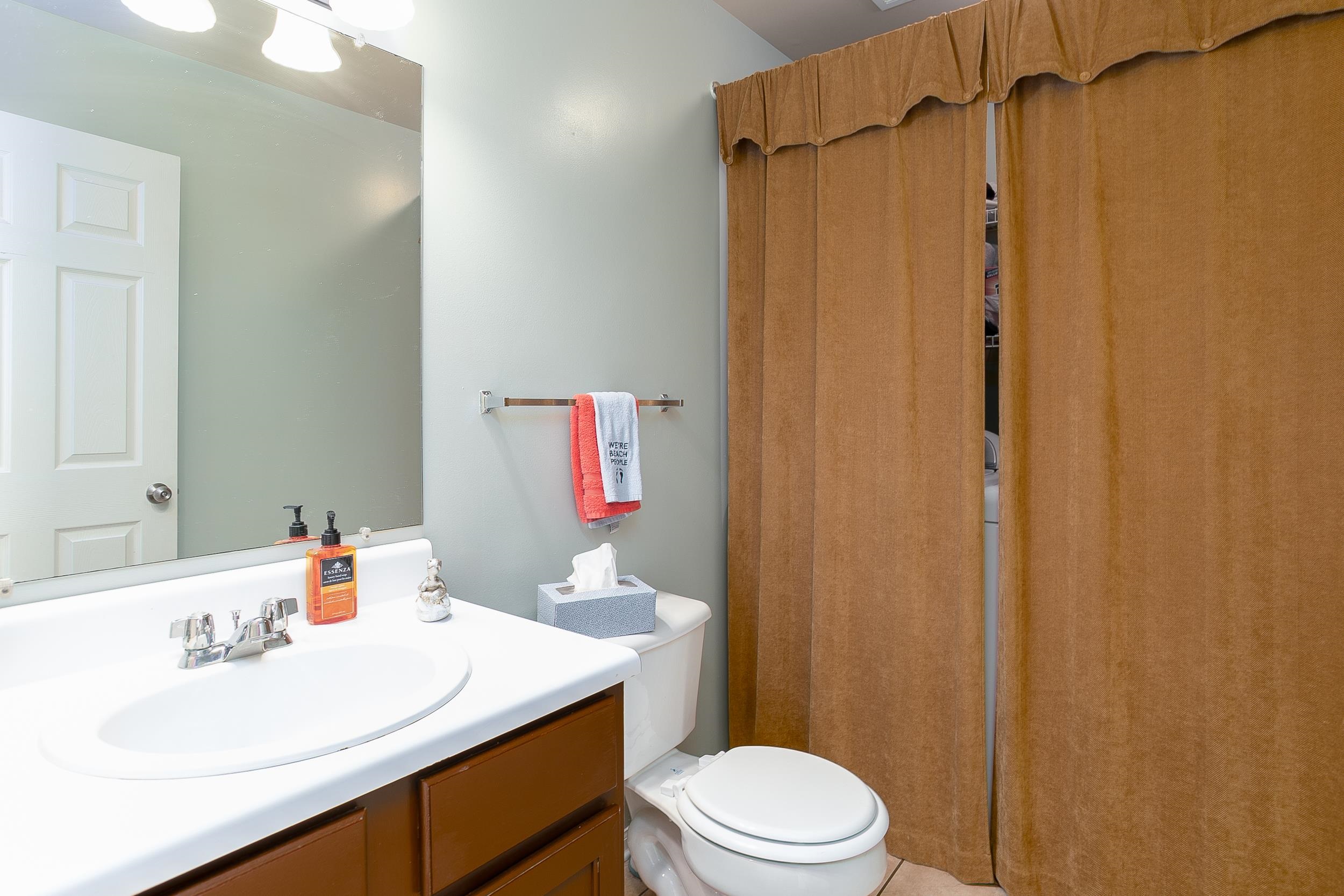 1517 Regency Road, Unit 42 Gulf Shores, AL 36542 - Photo 5 of 39 Half Bath/Laundry Room