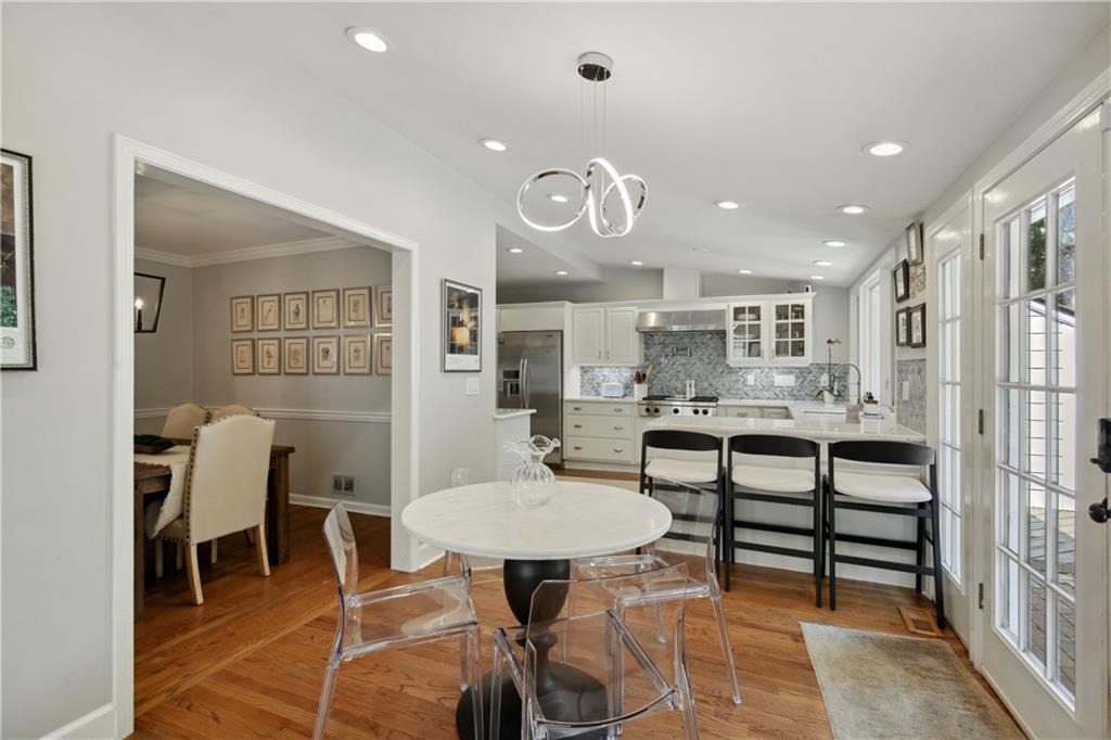 1403 Moores Mill Road Northwest Atlanta, GA 30327 - Photo 14 of 30 a view of a dining room with furniture