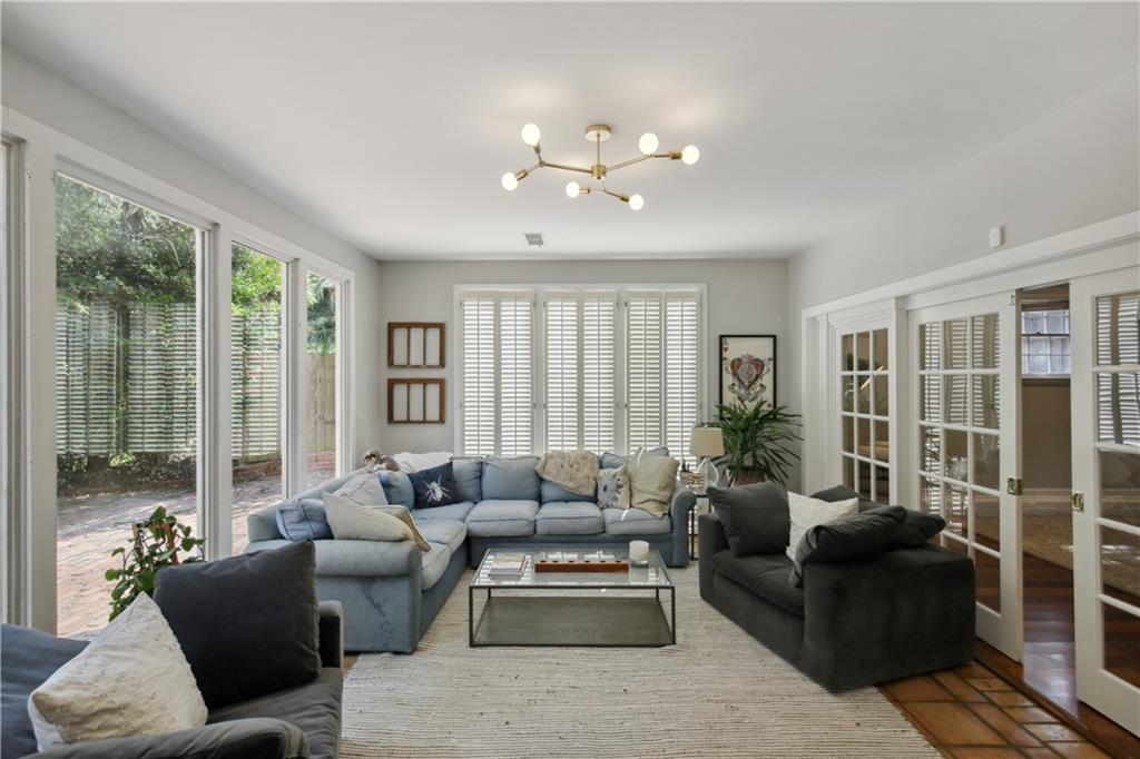 1403 Moores Mill Road Northwest Atlanta, GA 30327 - Photo 15 of 30 a living room with furniture and a large window