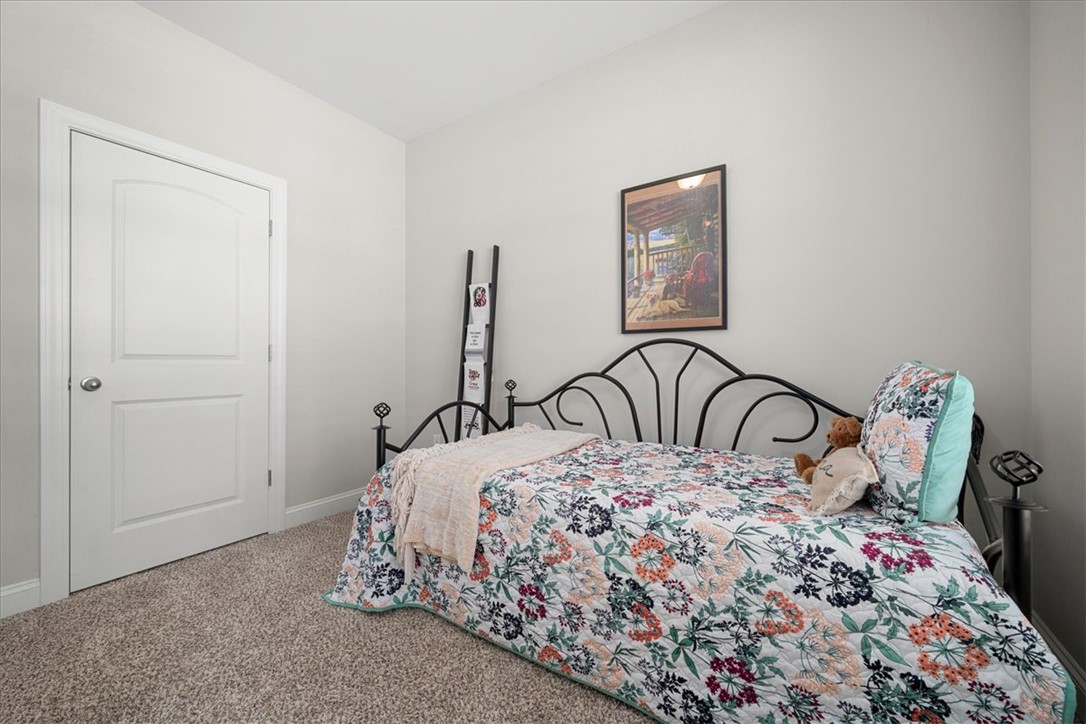 21 Barron Glenn Way Anderson, SC 29621 - Photo 39 of 48 This secondary Bedroom #3 has a closet and single door to provide more wall space.