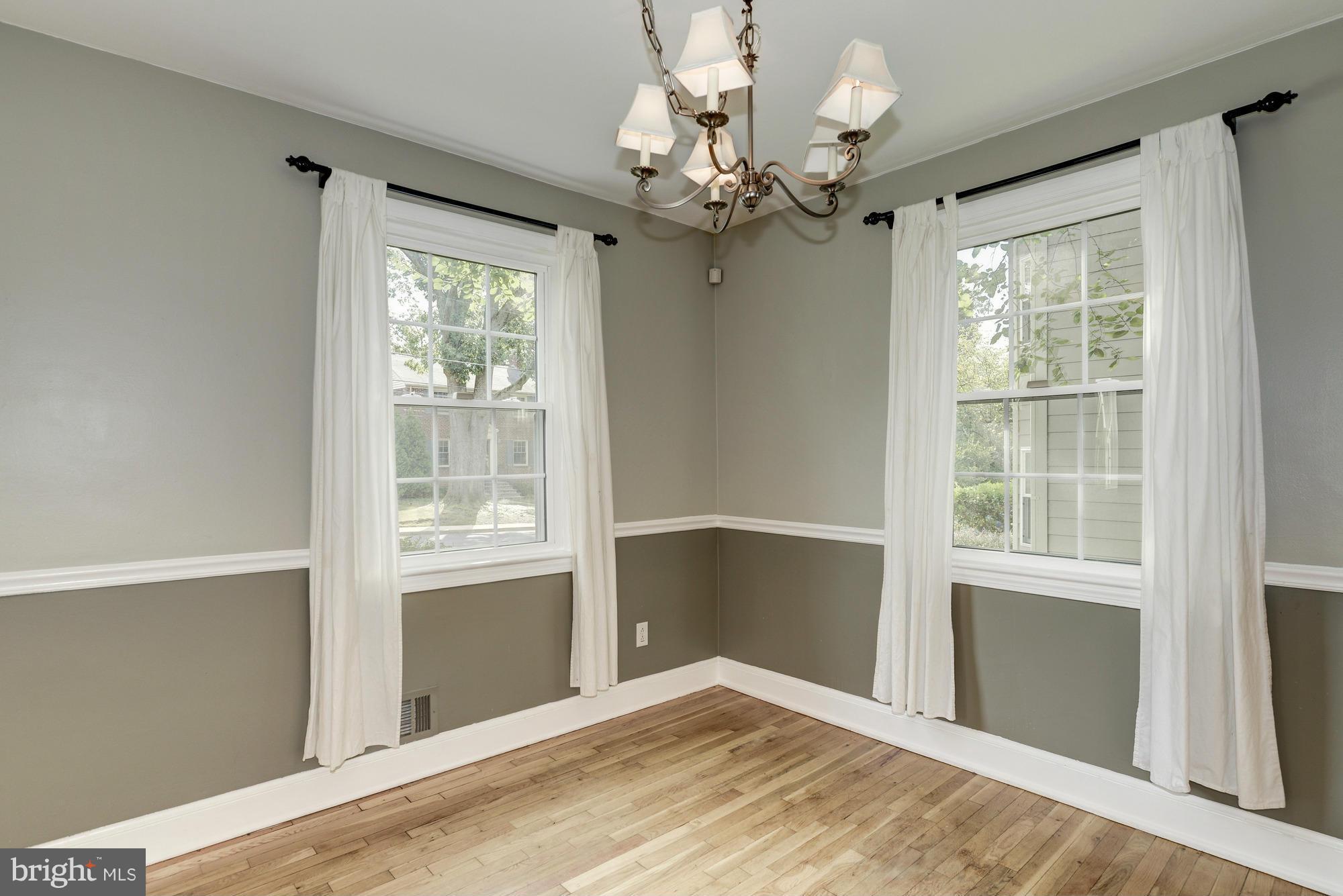 9006 Walden Road Silver Spring, MD 20901 - Photo 12 of 30 a view of an empty room with a window