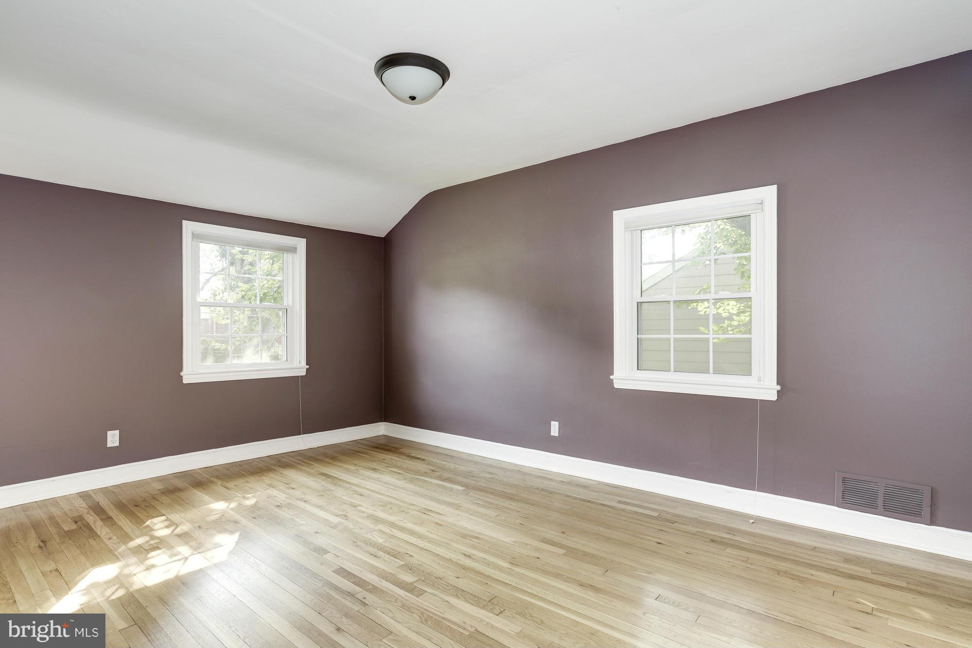 9006 Walden Road Silver Spring, MD 20901 - Photo 16 of 30 a view of an empty room with a window