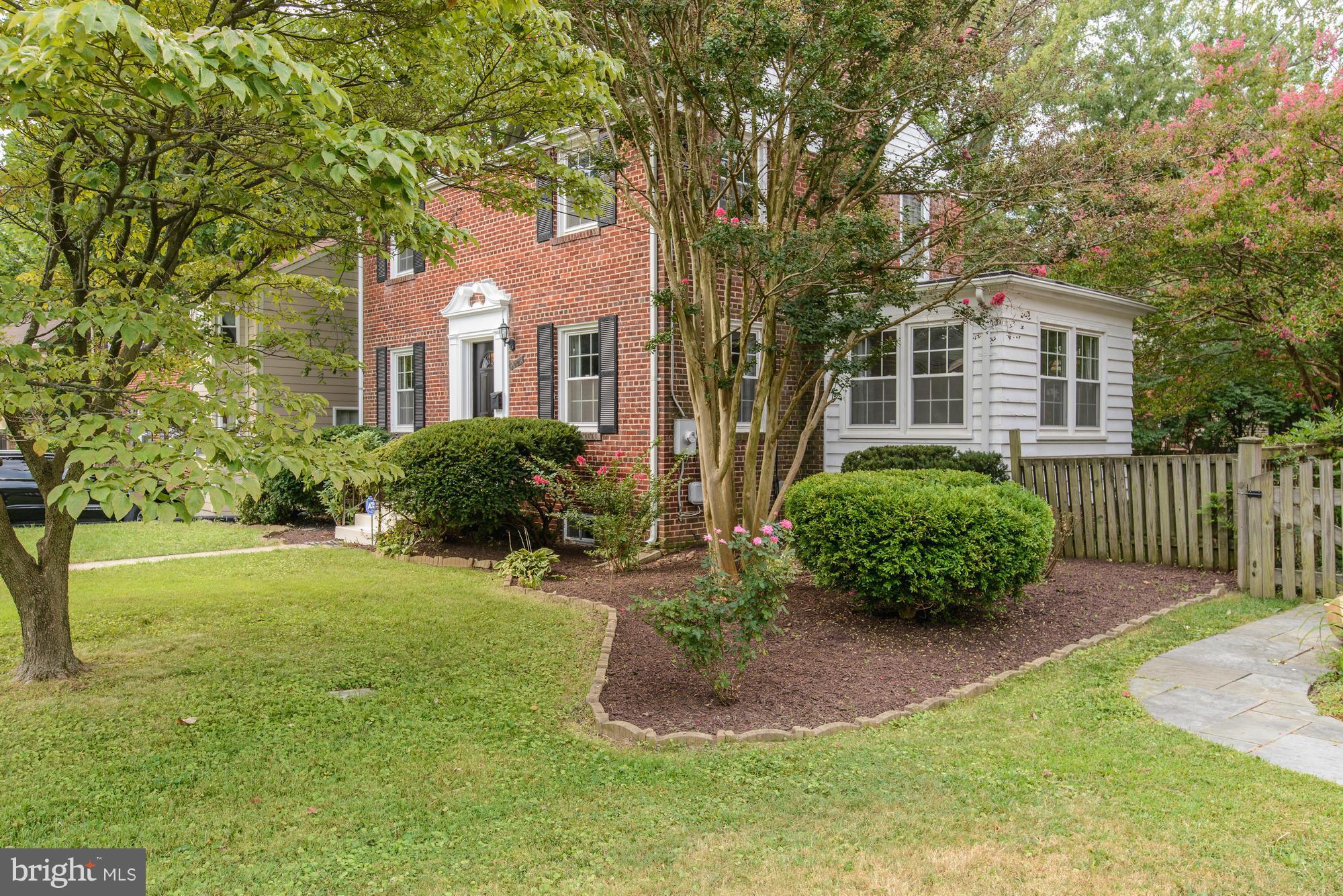 9006 Walden Road Silver Spring, MD 20901 - Photo 3 of 30 a front view of a house with a yard