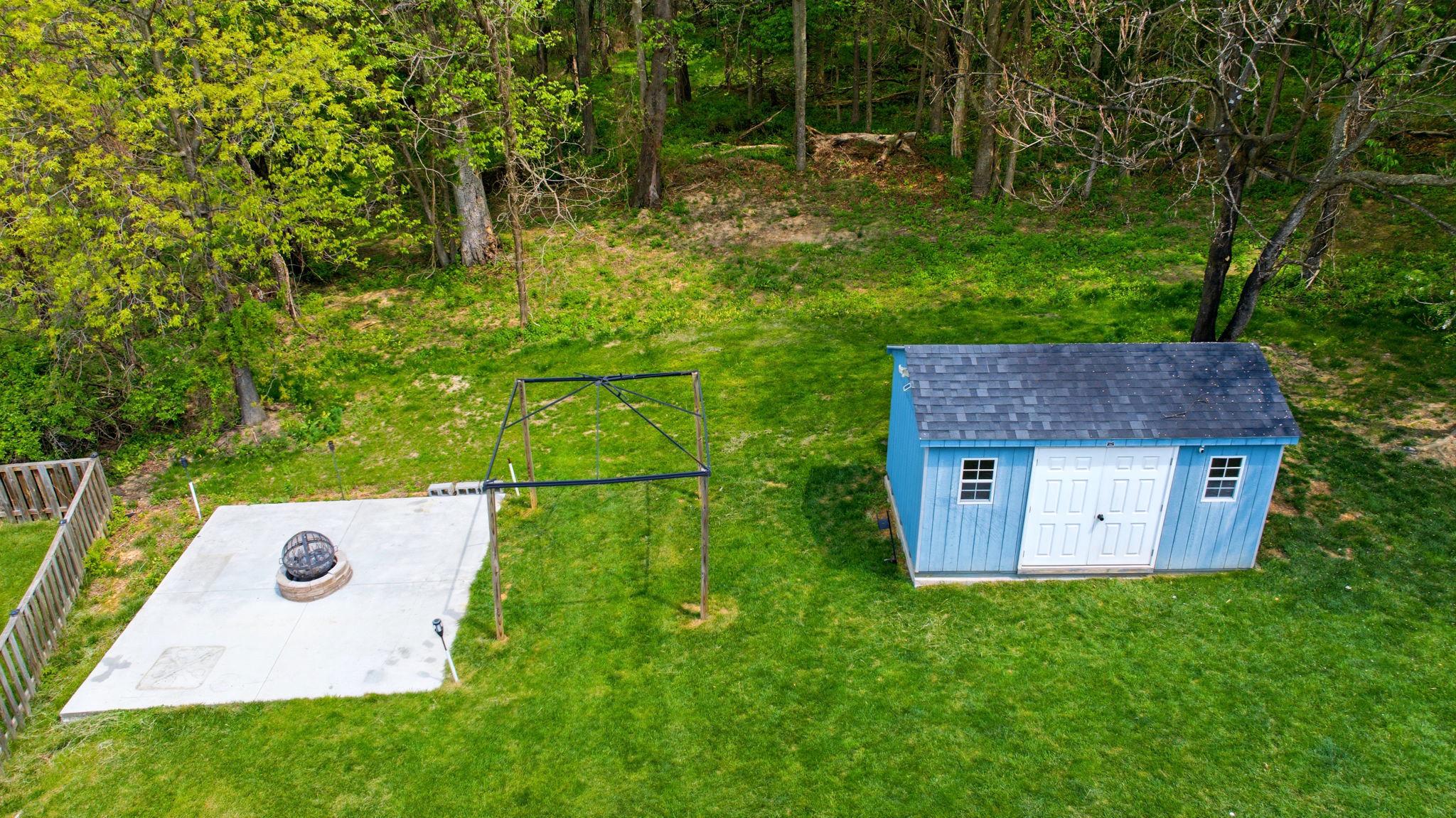457 Hughs Road Charles Town, WV 25414 - Photo 66 of 73 Charming outdoor space with shed.