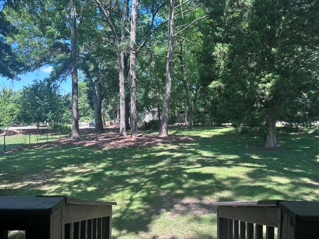 1261 Concord Road Southeast Smyrna, GA 30080 - Photo 41 of 50 a view of outdoor space with green field and trees