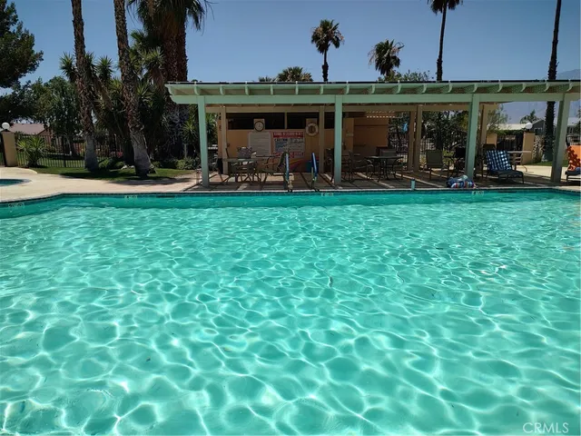 a view of a backyard of the house