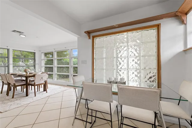 a kitchen with cabinets and a stove top oven